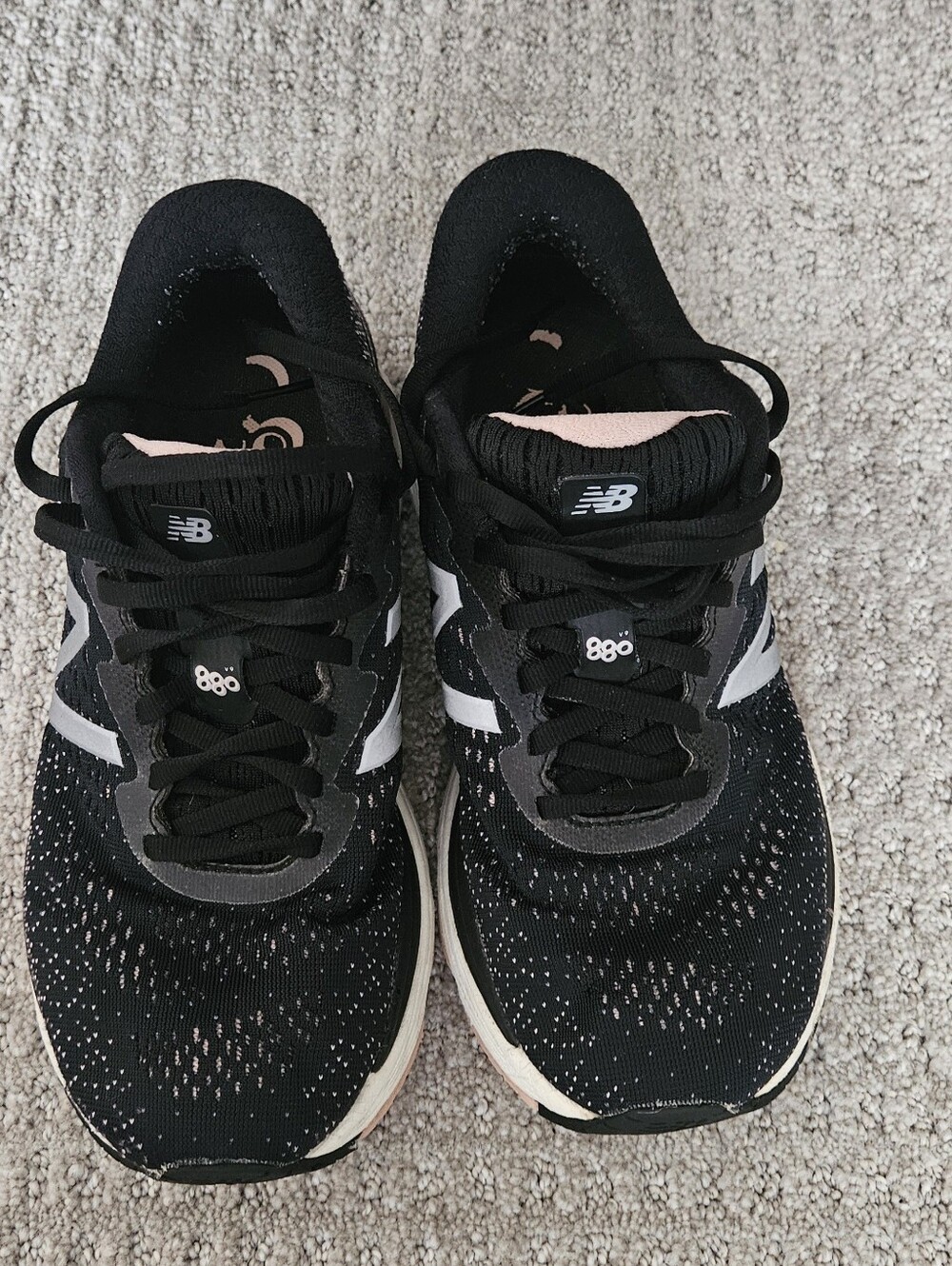 New Balance Women's Black Athletic Running Shoes with Pink Accents